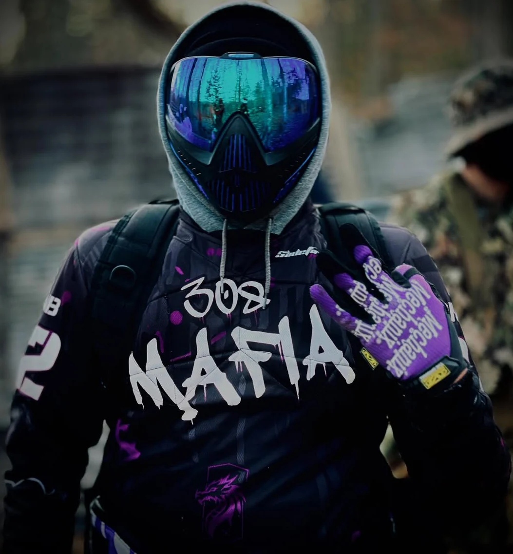 308 Mafia player wearing a custom purple and black SlideFirePro jersey