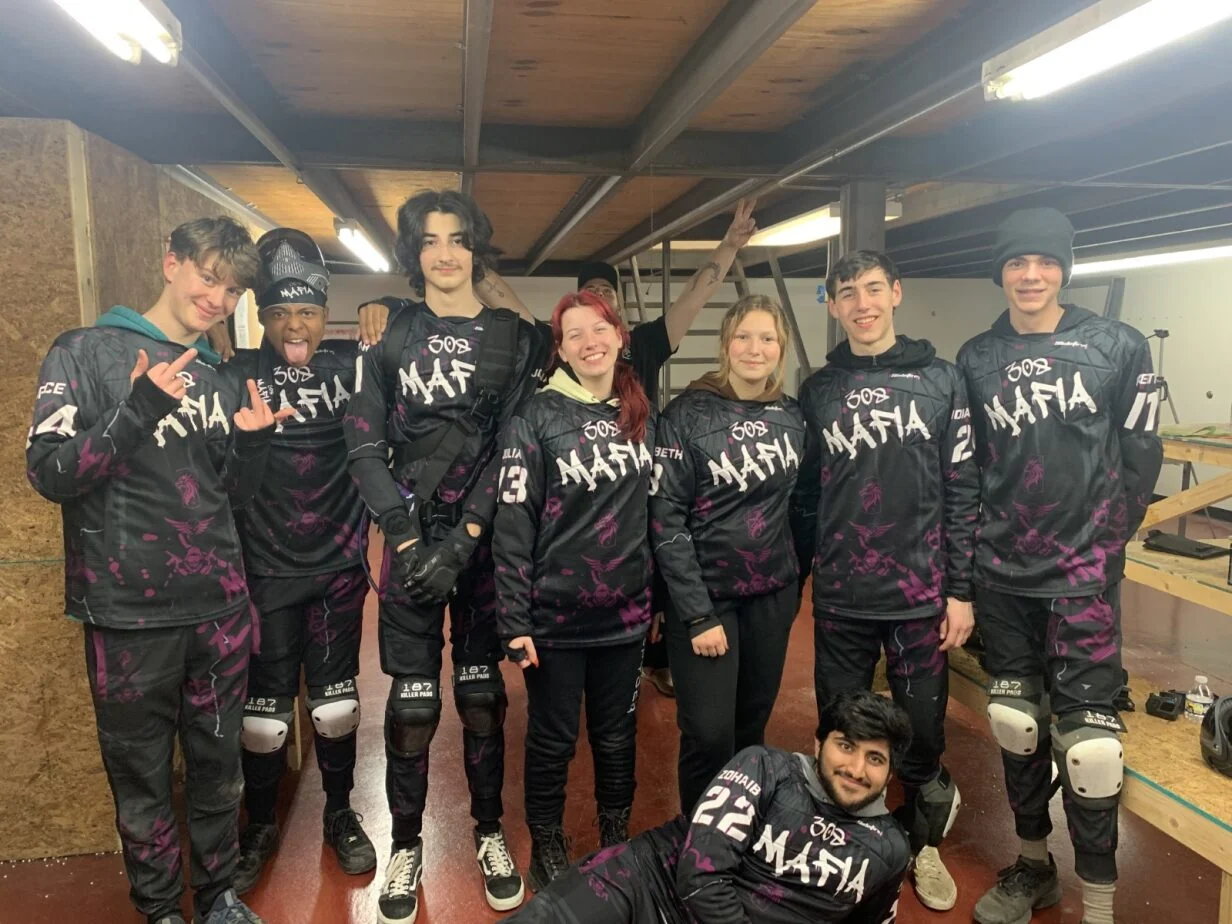 308 Mafia team wearing matching custom jerseys